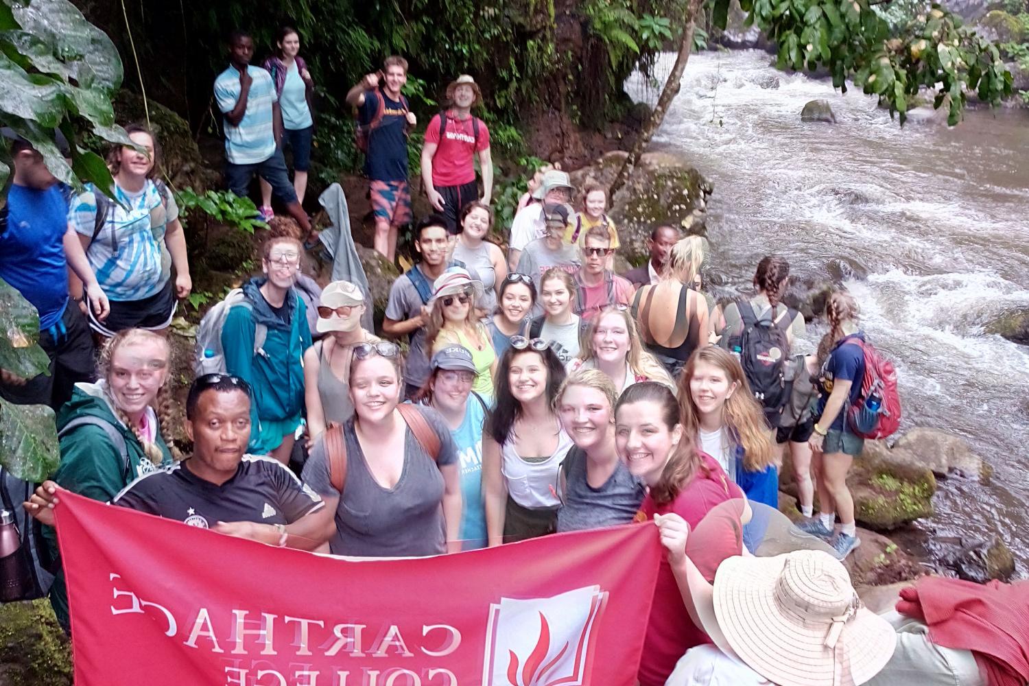 A group photo of students on the study tour to Tanzania.