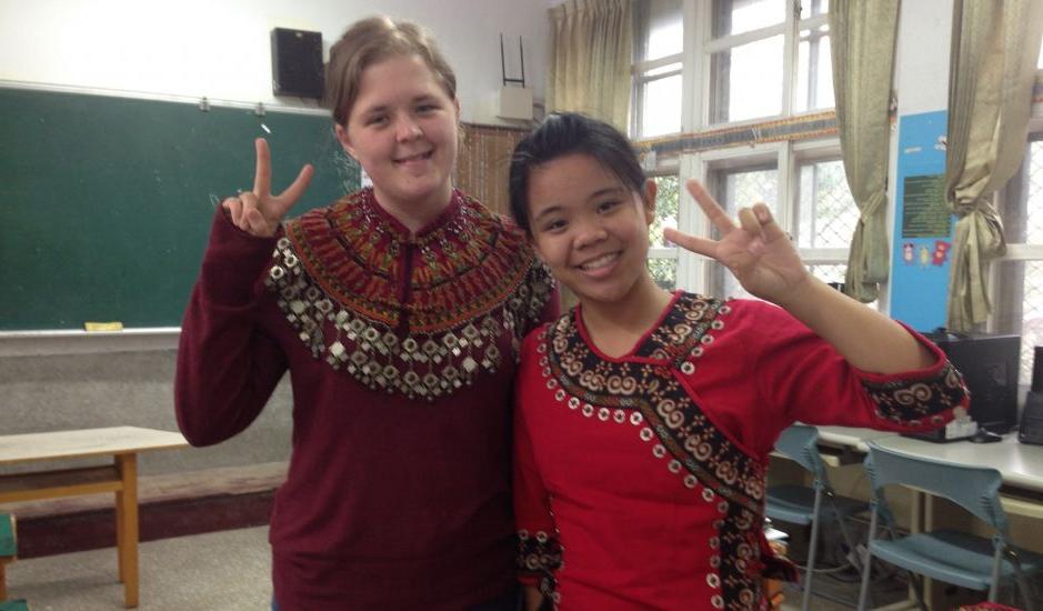 Jessie Bingaman ?16 dons a traditional Paiwan collar, with her sixth-grade student Annie, in trad...